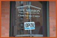 Mission feeds needy after they pray