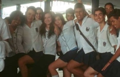Male high-school students wear skirts to back trans classmate