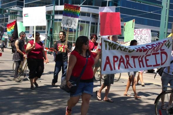 Queers Against Israeli Apartheid marches in Edmonton Pride