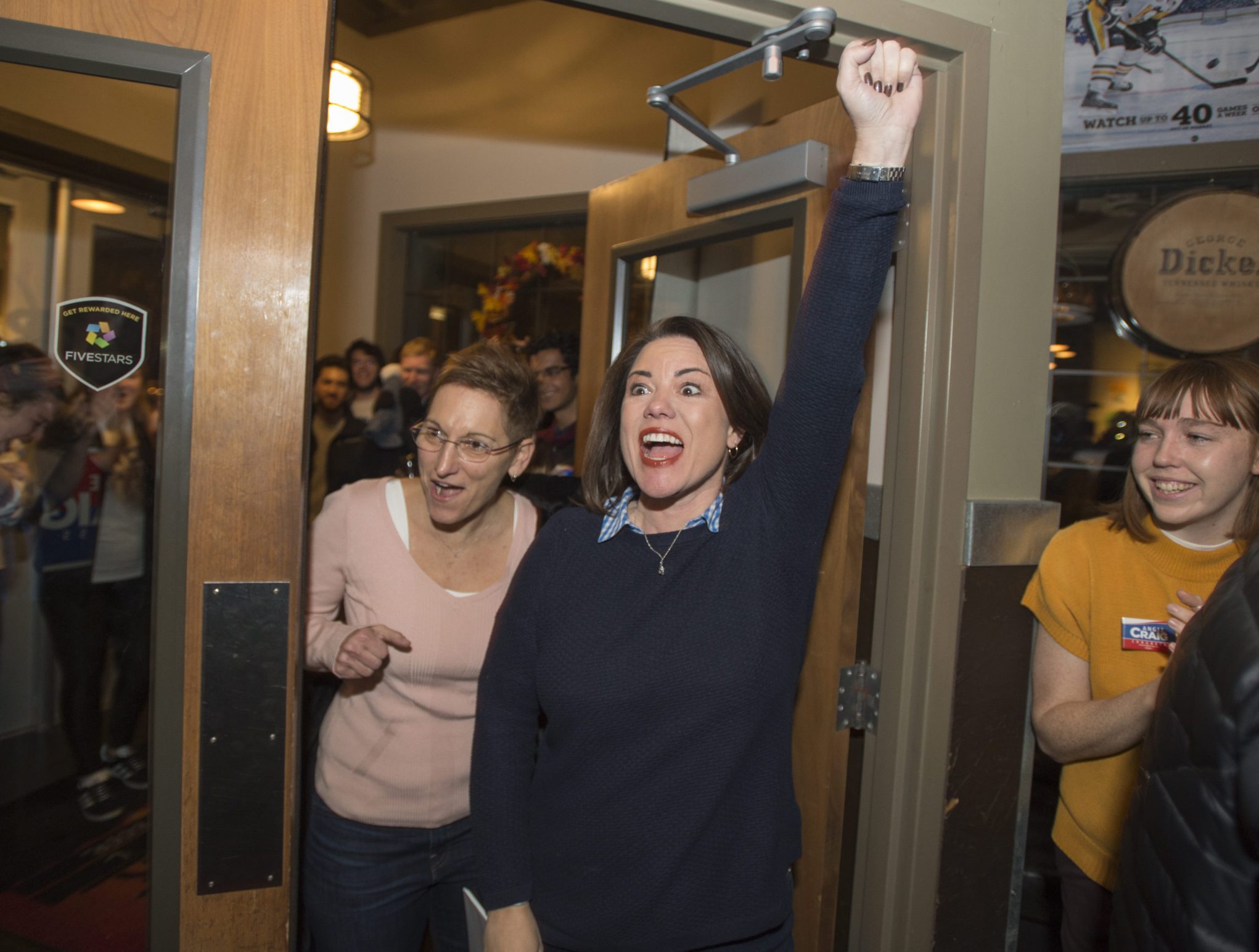 U.S. Representative Angie Craig celebrates her win in the 2018 mid-term general election with her wife, Cheryl Greene.