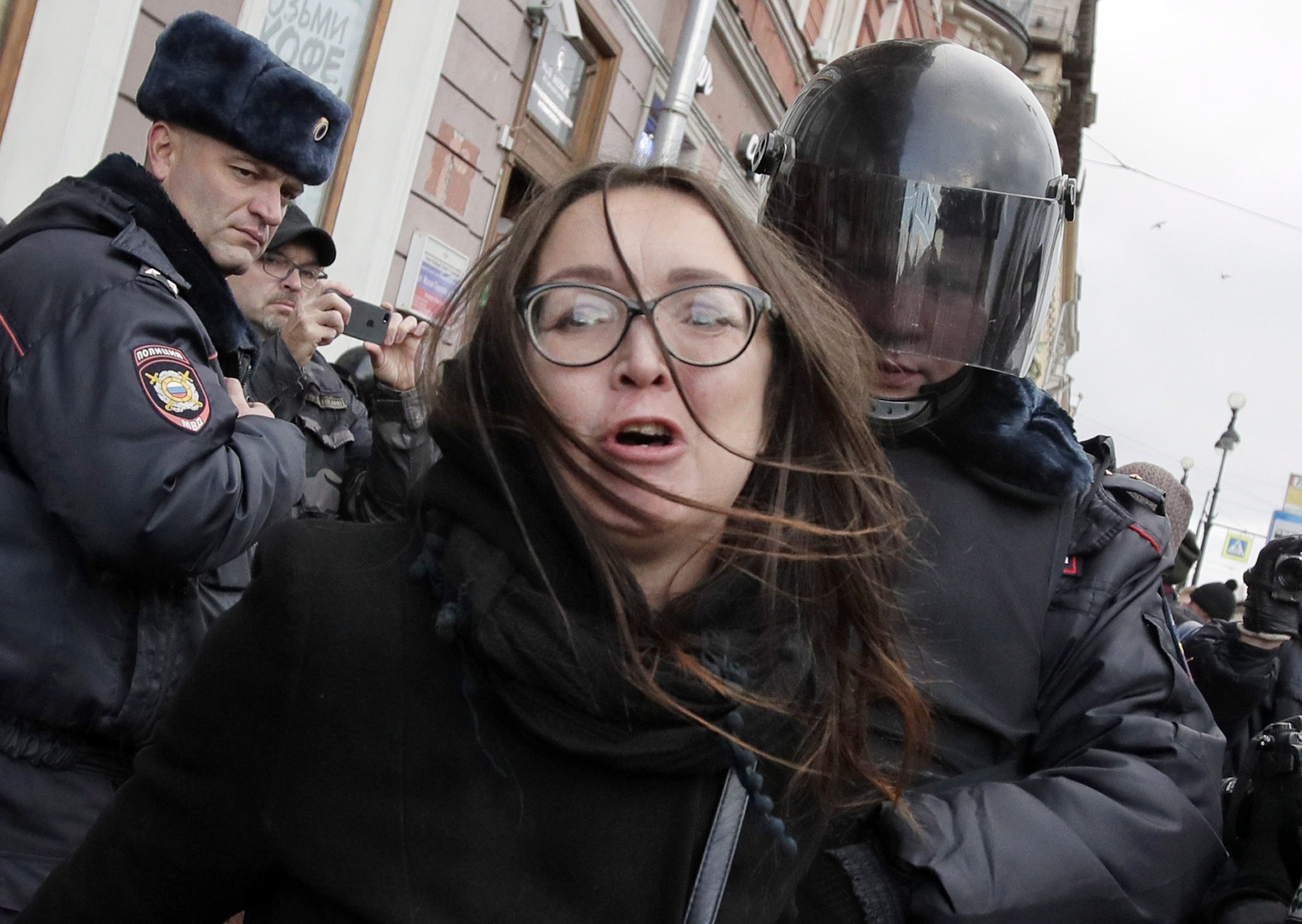Police detain political and LGBT rights activist Yelena Grigoryev during a rally in St. Petersburg, Russia, in October 2018. She was murdered nine months later.