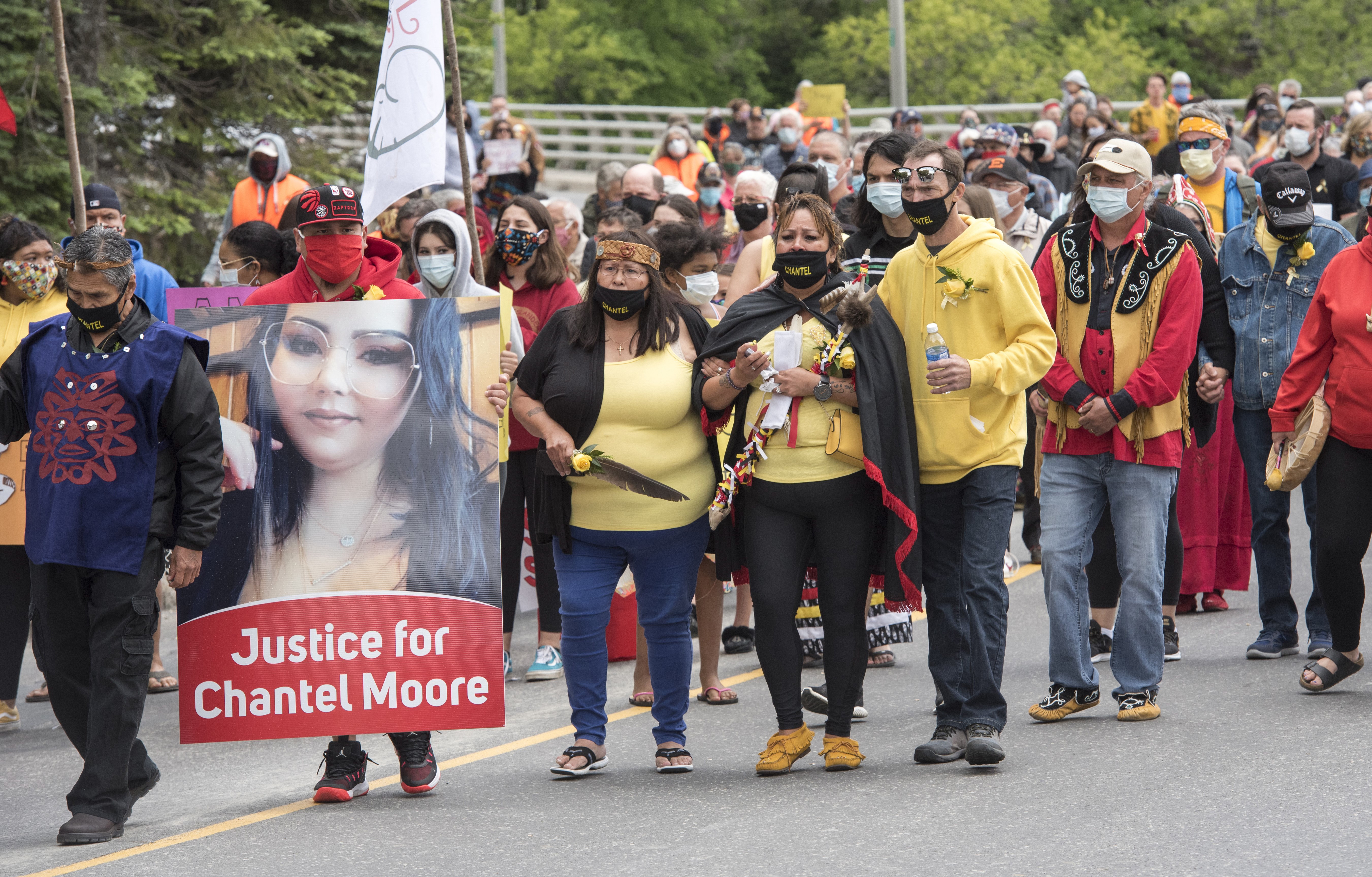 Chantel Moore’s mother Martha Martin, centre, participates in a healing walk from the Madawaska Malaseet reserve to Edmundston's town square honour Moore in Edmundston, N.B. Moore was a 26-year-old Indigenous woman who was fatally shot by police in Edmundston.