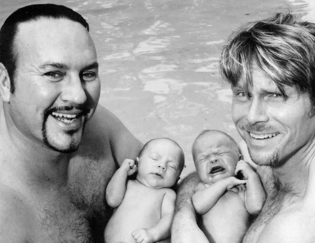 Curtis Shaw, Desmond Child, and their two sons.