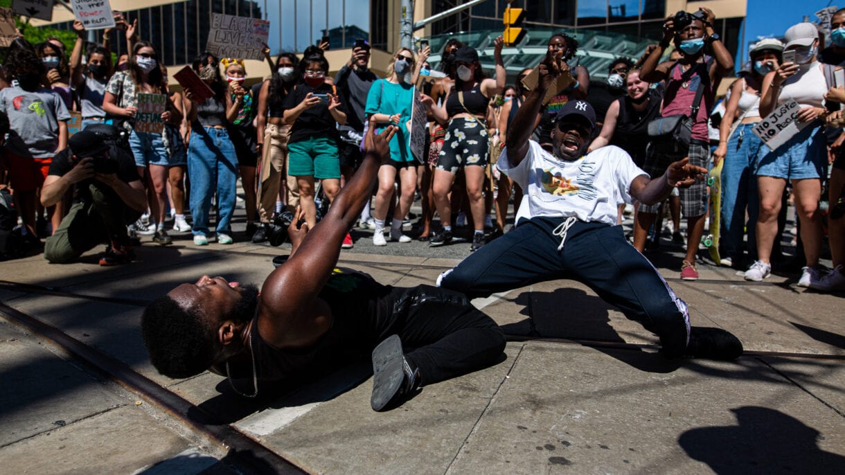 Two men dance during the sit-in.