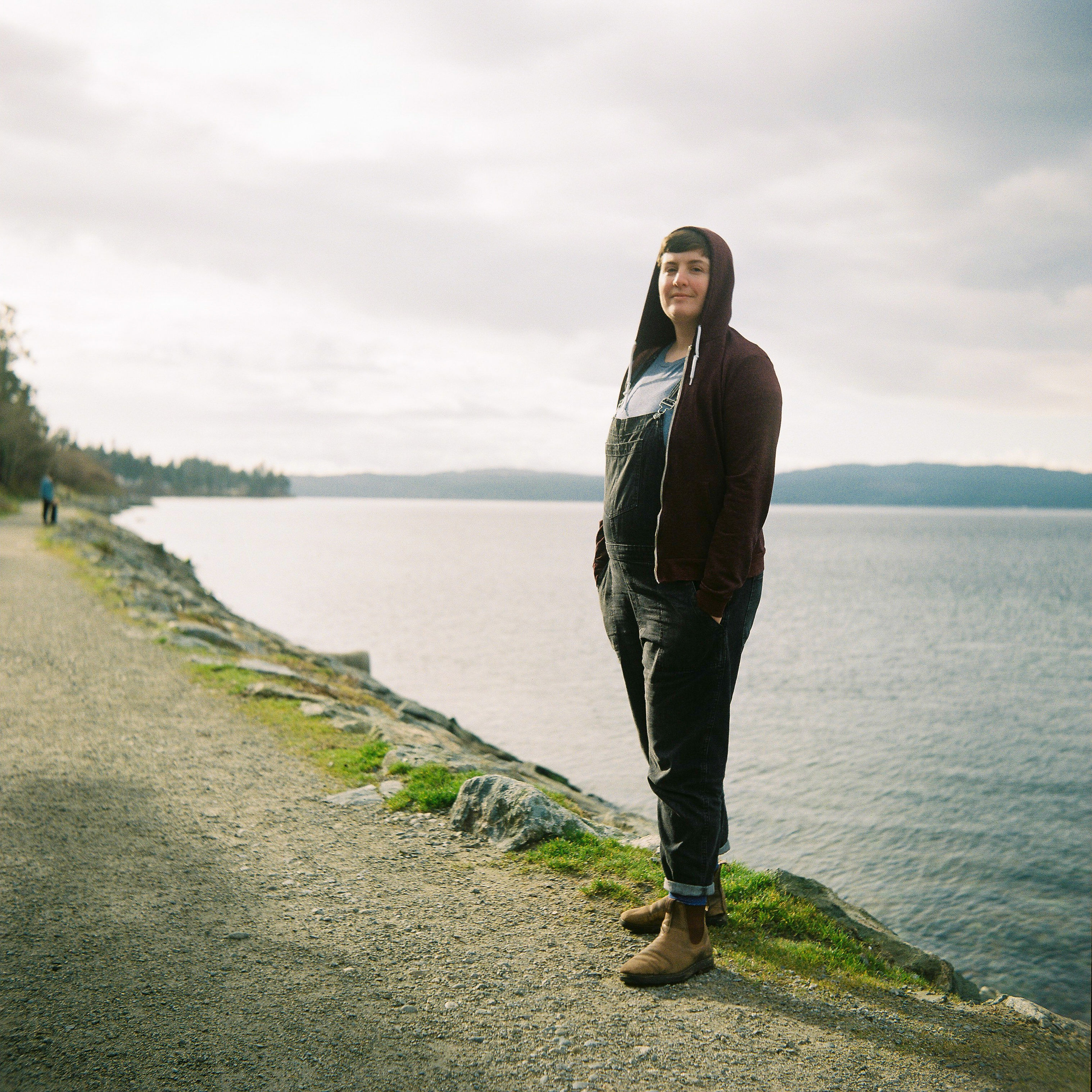 The author, andrea bennett, in overalls