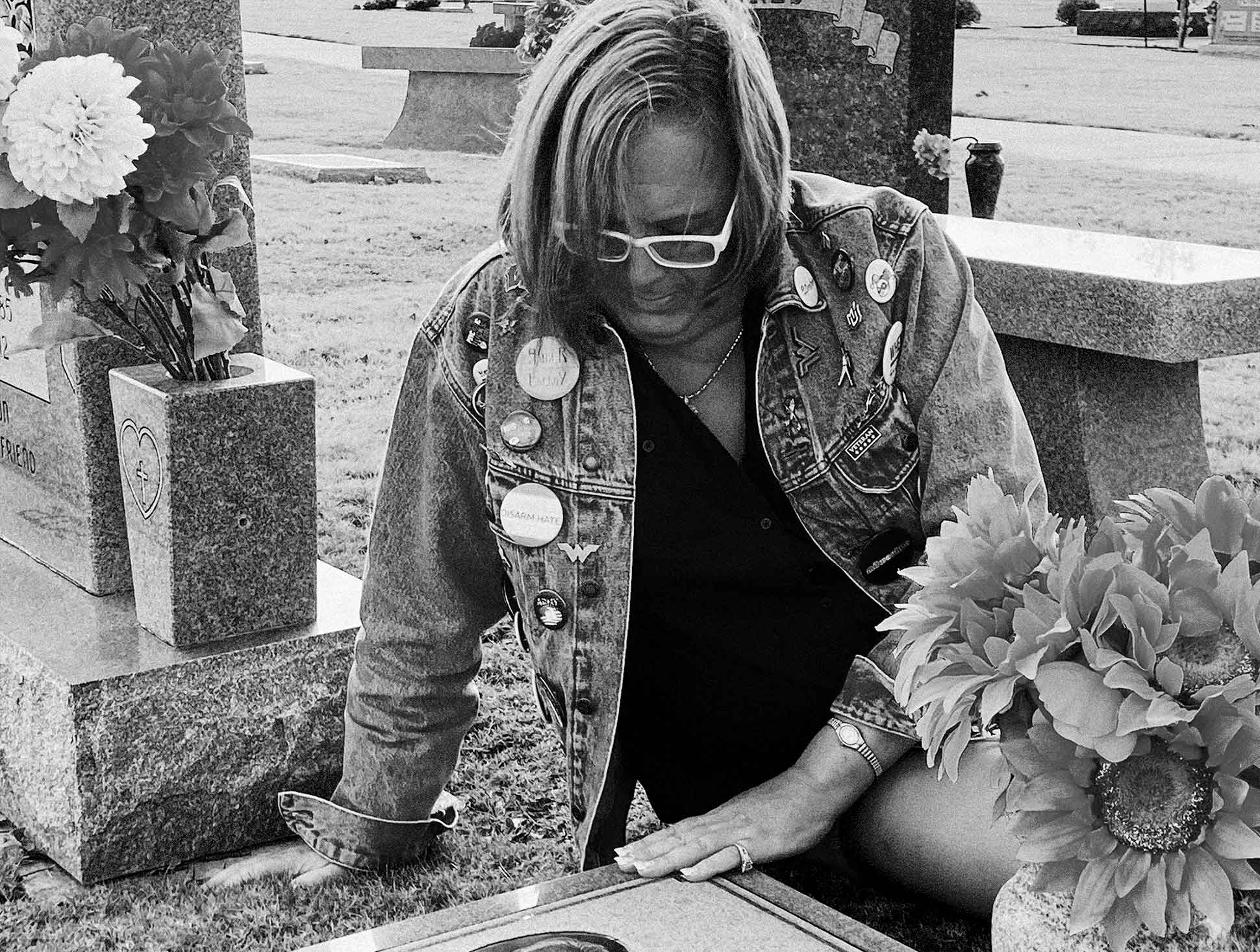 Amber, a trans military vet, visits Joe’s grave site.