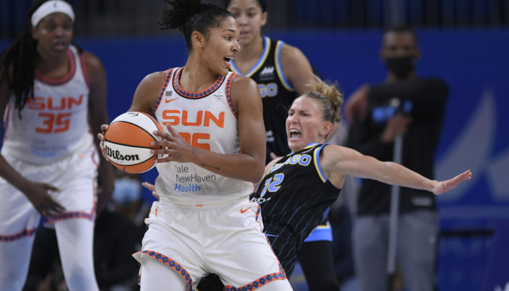 A WNBA playoff game featured three couples on the court this week