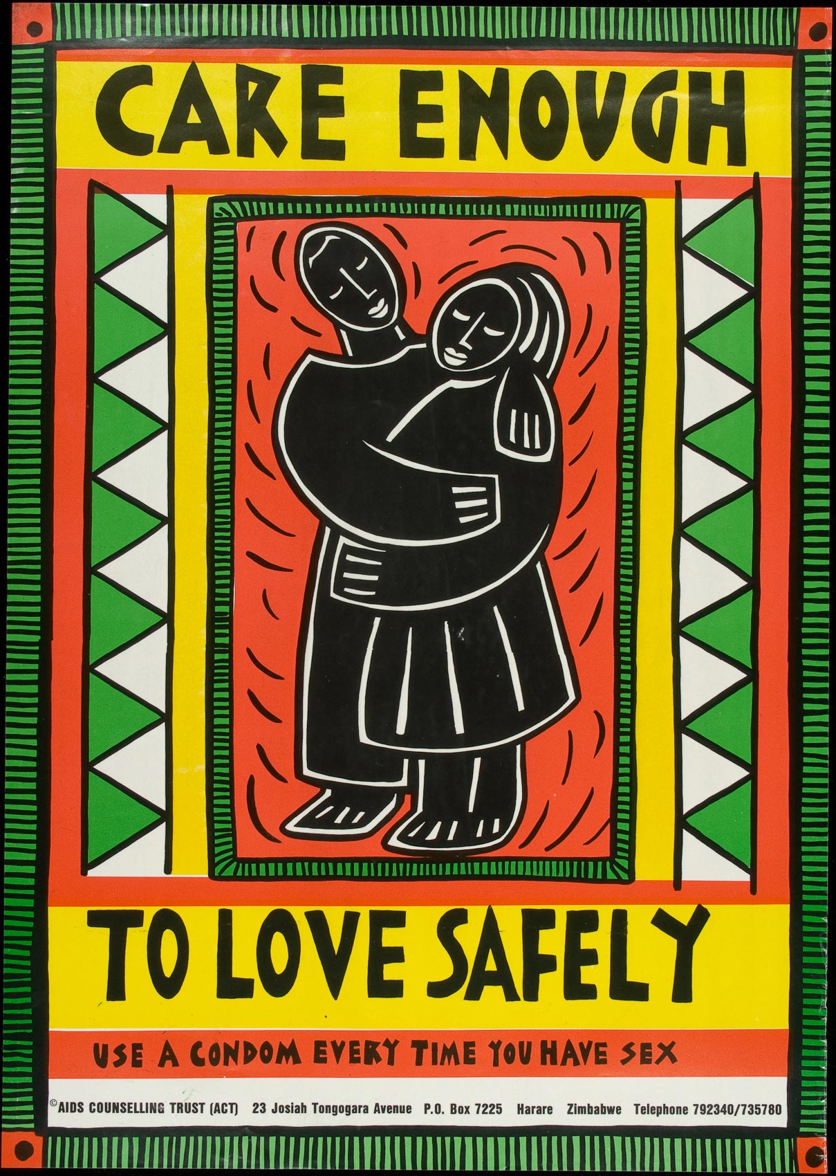 Drawn figures of a man and a woman embrace surrounded by red, yellow and green graphics.