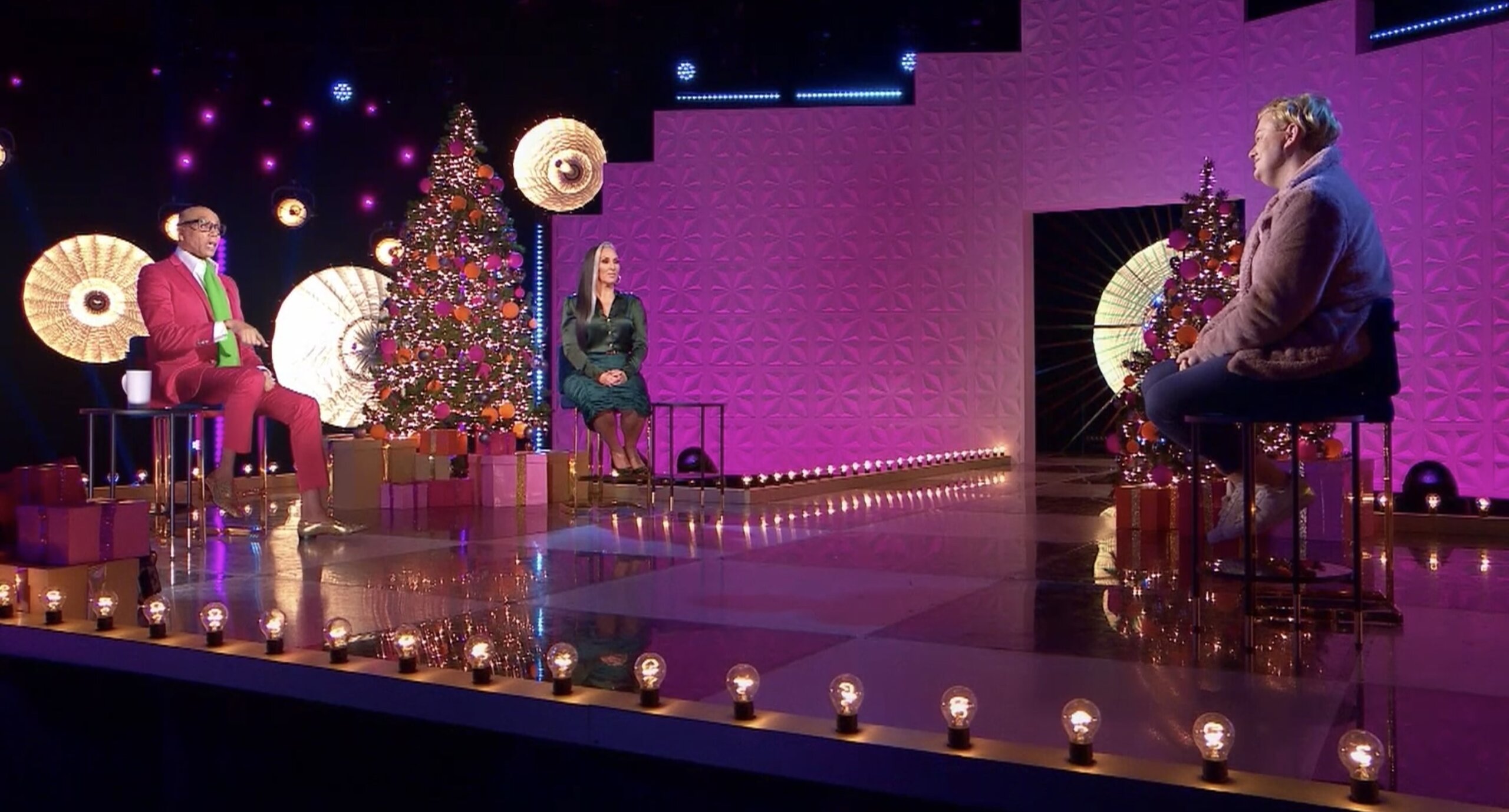 Kitty Scott-Claus chats with RuPaul and Michelle Visage during the RuPaul's Drag Race UKSeason 3 finale.