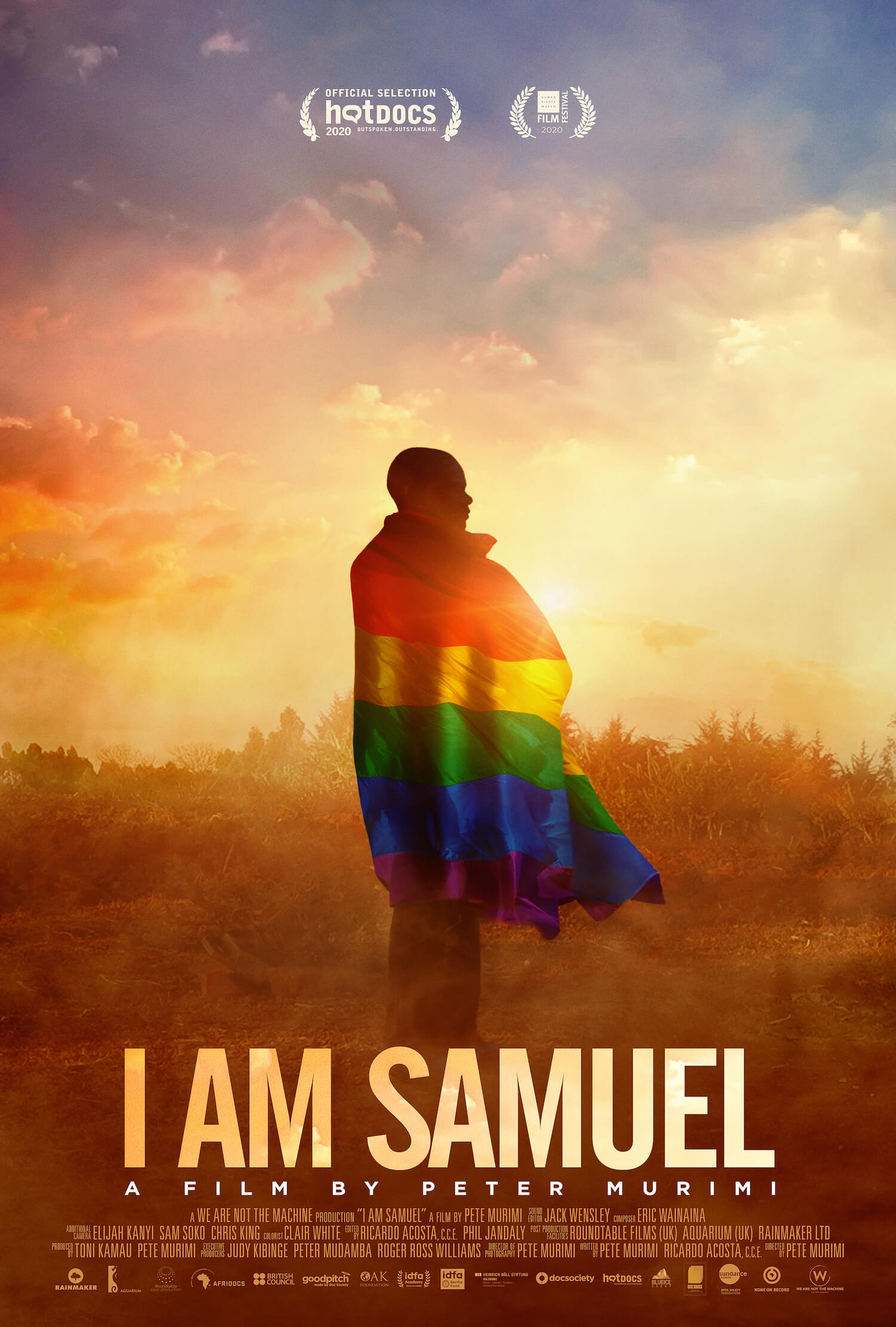 ’I Am Samuel’ film poster, featuring a young man in a field with a rainbow flag draped over him