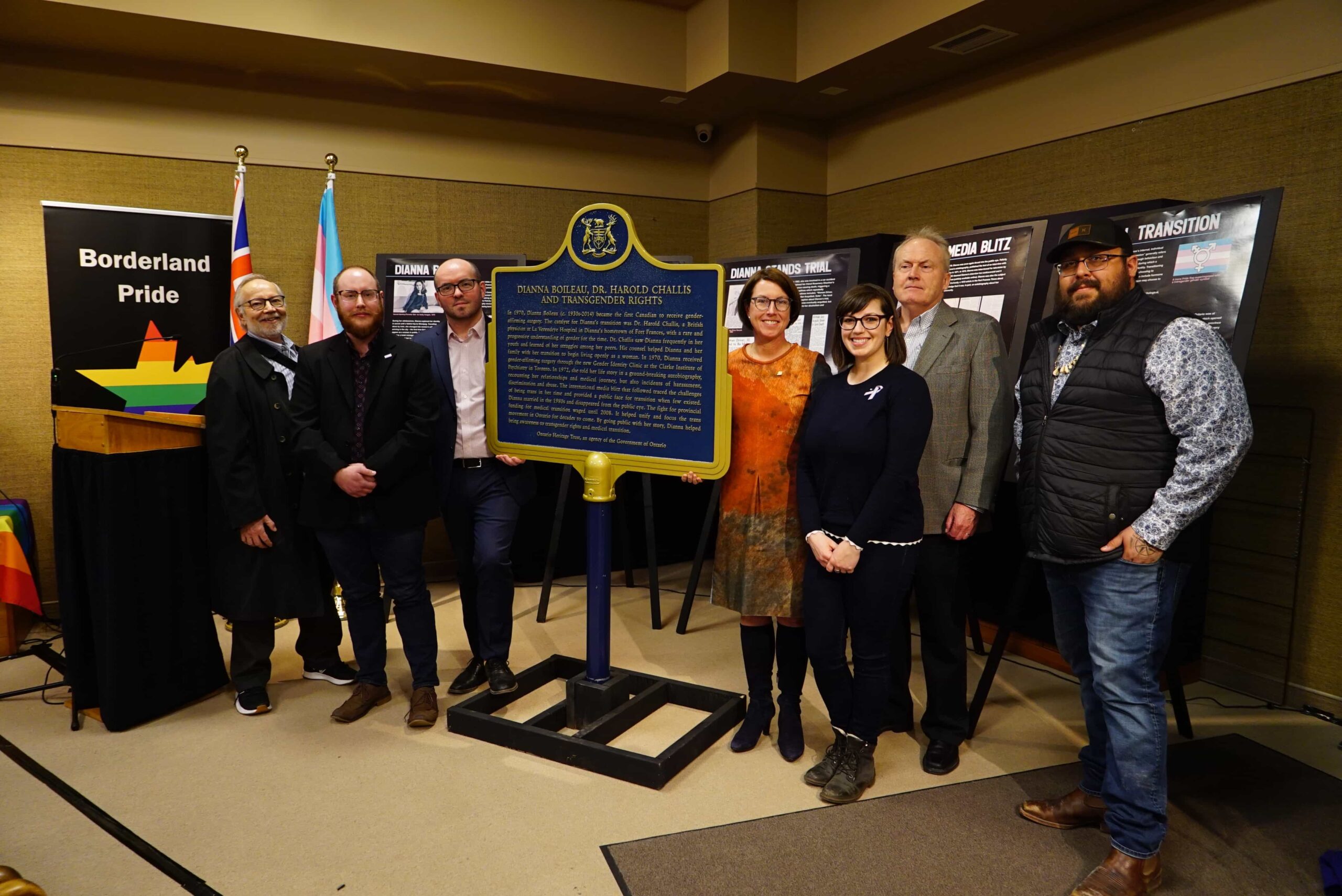 The Ontario Heritage Trust and Borderland Pride unveil a new provincial plaque commemorating Dianna Boileau and Dr. Harold Challis and trans rights on March 31, 2023 (International Transgender Day of Visibility) in Fort Frances, Ontario.
