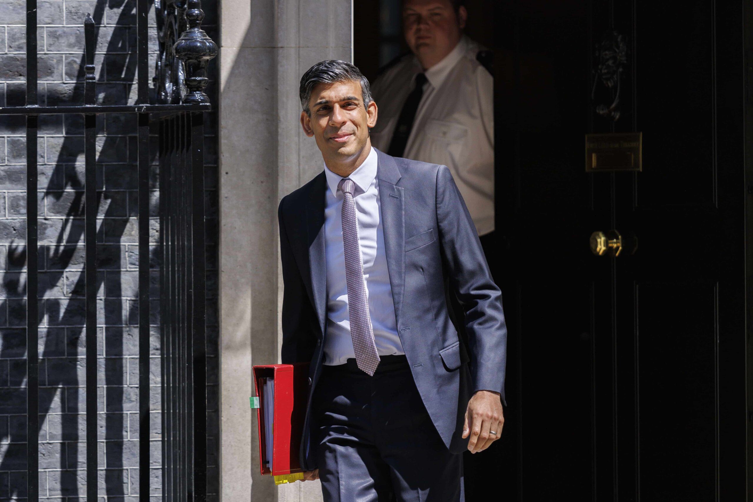 British Prime Minister Rishi Sunak leaves Downing Street.