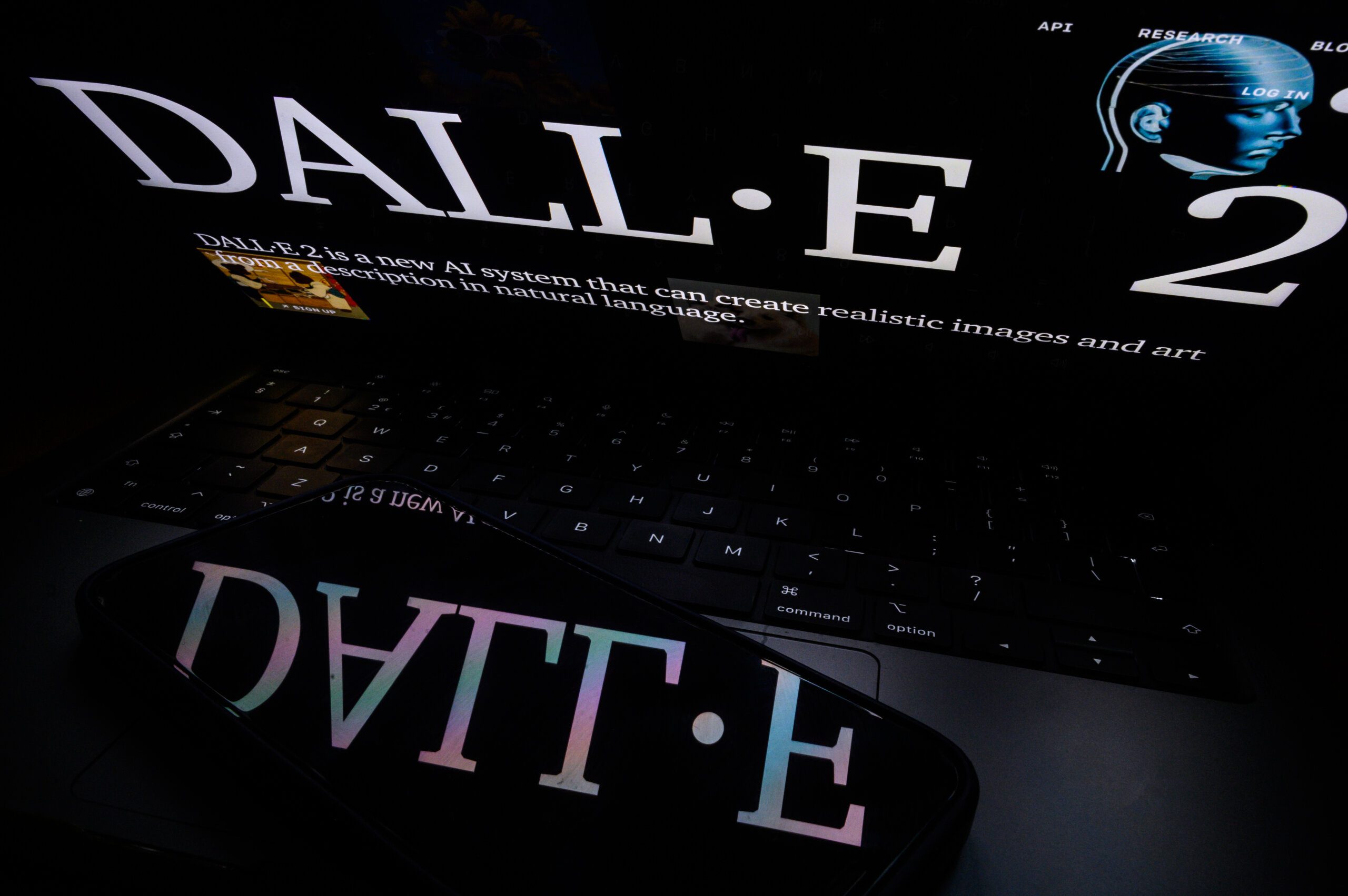 In this photo illustration, the logo to the OpenAI "Dall-E" AI image generation app is seen on a laptop screen.