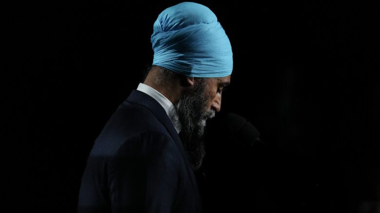 Jagmeet Singh looking down.