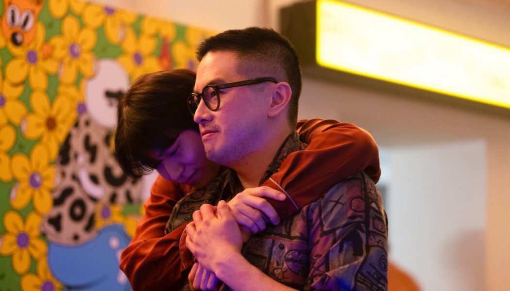 Bowen Yang and Han Gi-Chan embracing