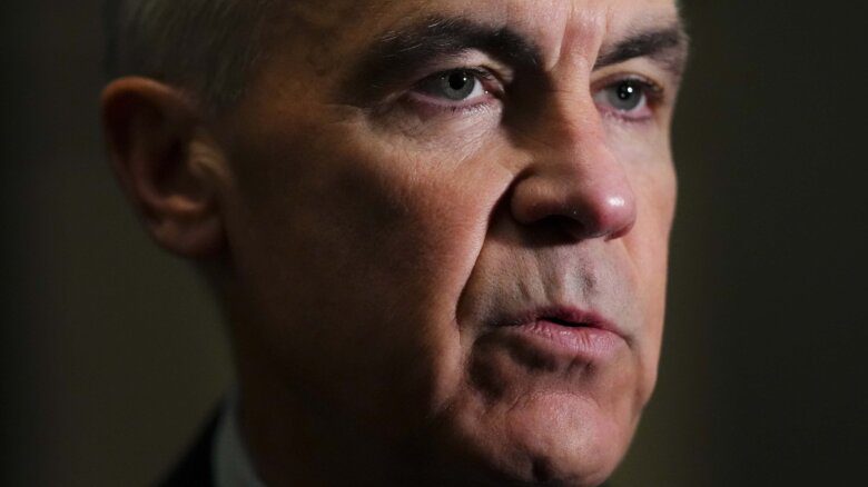 A close up of Prime Minister Mark Carney's face