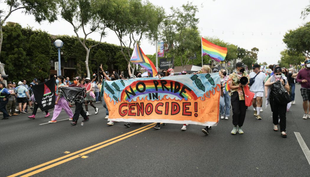 No Pride in Genocide banner at a Pride Parade, an organizing phrase often used for Human Rights Campaign