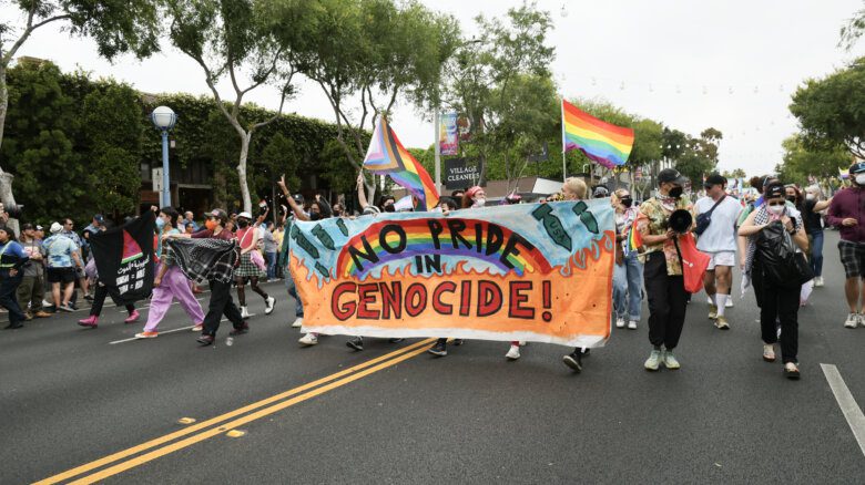 No Pride in Genocide banner at a Pride Parade, an organizing phrase often used for Human Rights Campaign
