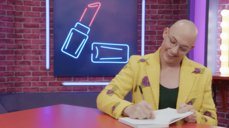 Alyssa Edwards out of drag writing in a notebook