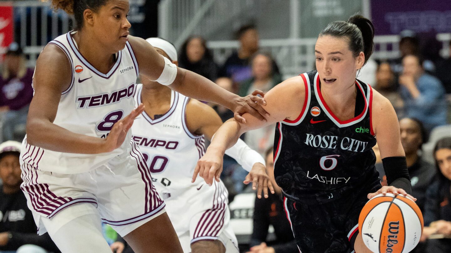 Portland Fire guard Bridget Carleton (6) drives against Toronto Tempo forward Nyara Sabally (8).
