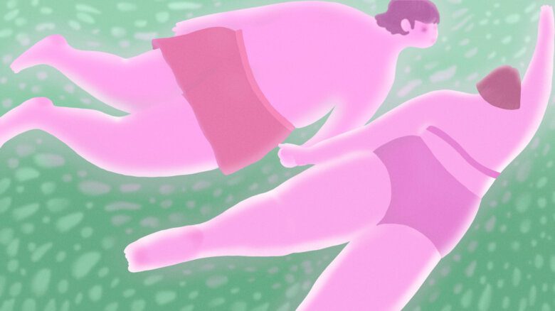 Two pink figures swimming