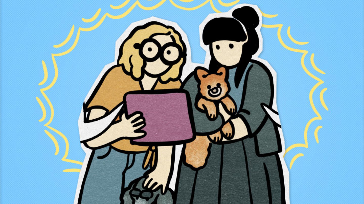 A cartoon of two people standing close together; one is holding a puppy, the other is holding a book